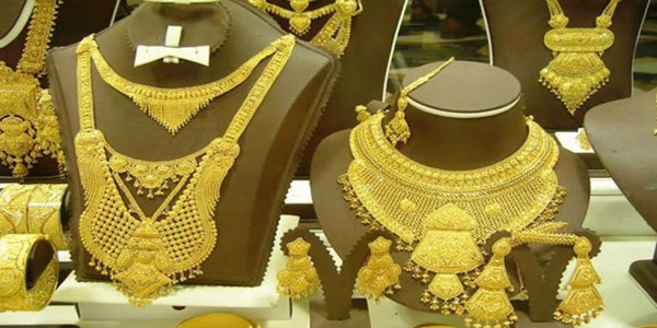 Gold price falls to over 10-month low