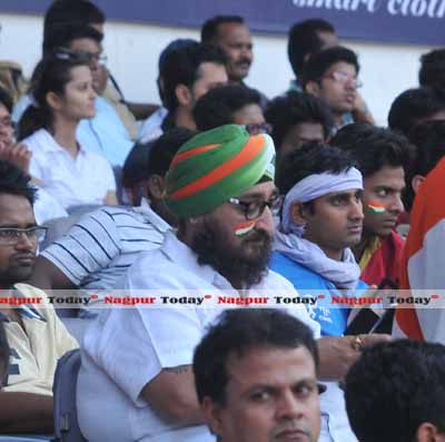 Chak De India… A Sikh cricket fan watches the team’s power play in awe at Jamtha stadium 