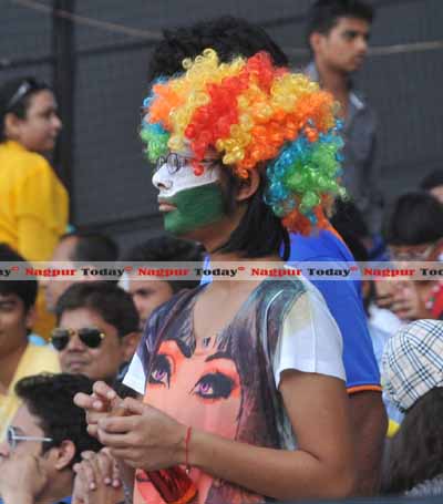 Cricketzy kiya re… An enthusiastic cricket lover got her face and hairs painted in colors to display her devil may care attitude, notwithstanding her craze for cricket 