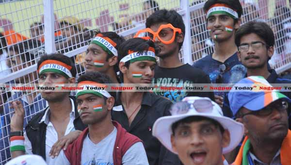 Band of Boys… Excited boys tied up bands on their forehead to cheer for Team India.  