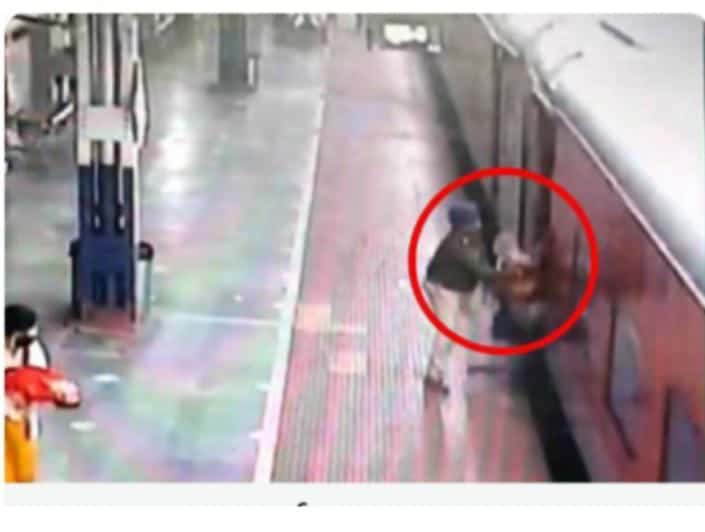Video: RPF Official saves woman from falling under moving ...