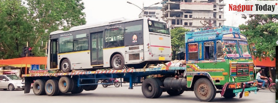 Curious E Bus Arrives In Nagpur Riding Atop Trailer Truck To Join