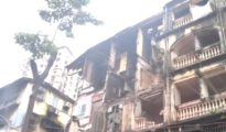 Woman dead as part of building crashes in Mumbai
