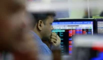 Sensex, Nifty tumble, rupee hits life-time low